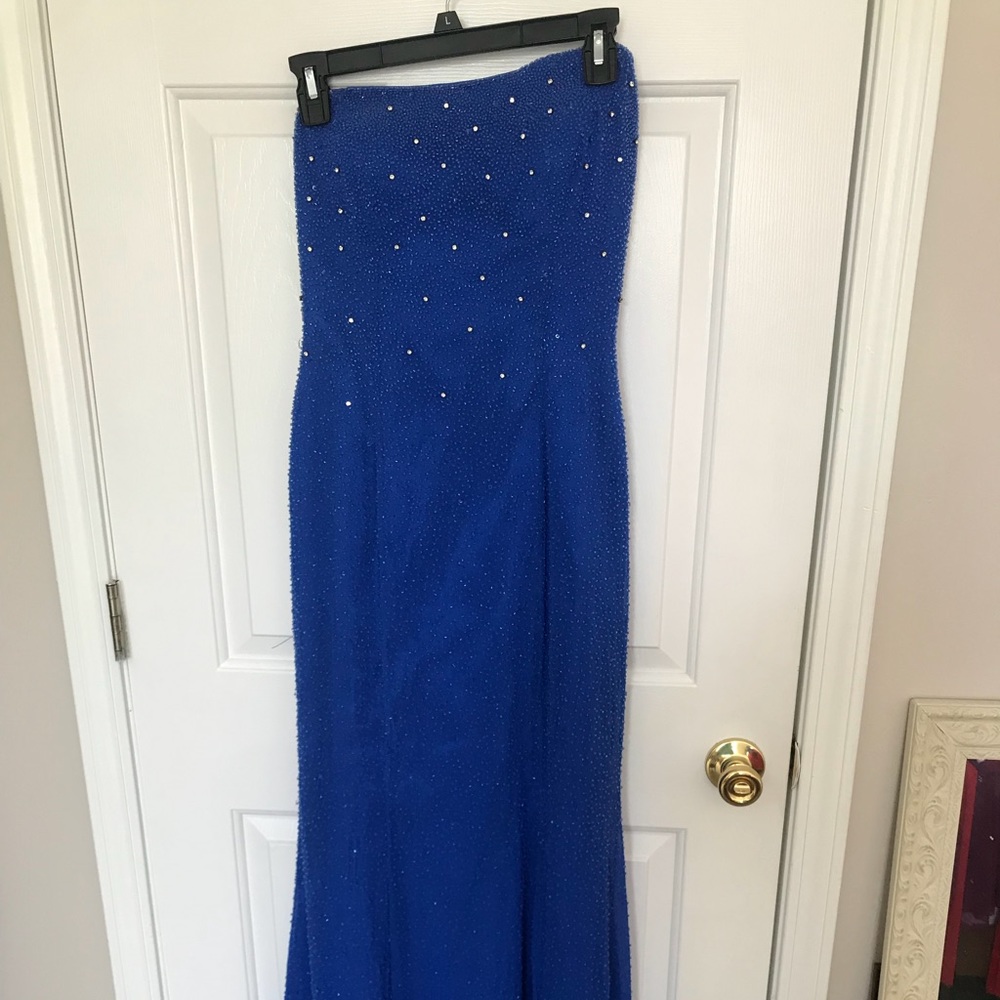 A blue off the shoulder dress